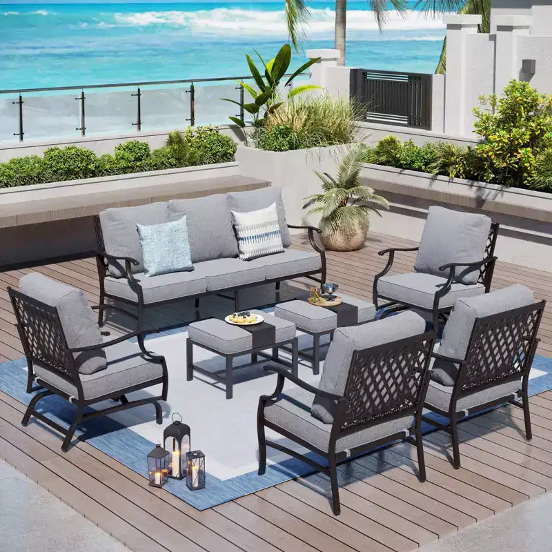 Captiva Designs 7pc Metal Patio Outdoor Conversation Set with Rocking Grid-back Chairs, Ottomans for Garden, Poolside, Backyard