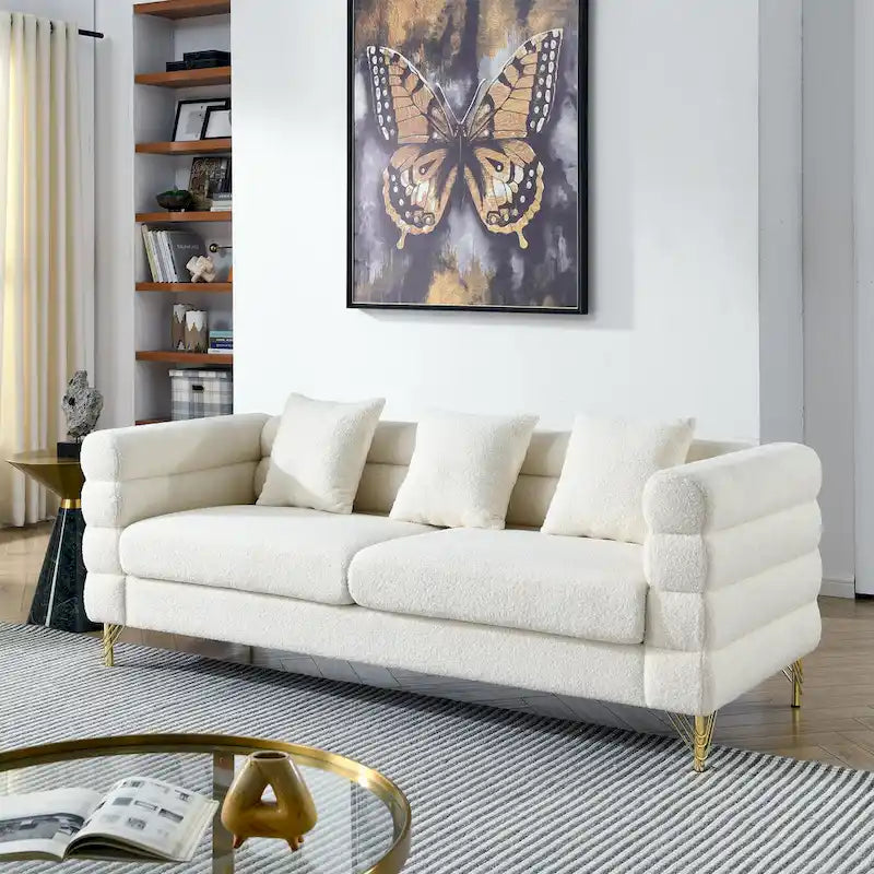 Canapé Art Déco 3 places en tissu Teddy, 3 coussins lombaires et pieds en métal doré — 205 cm