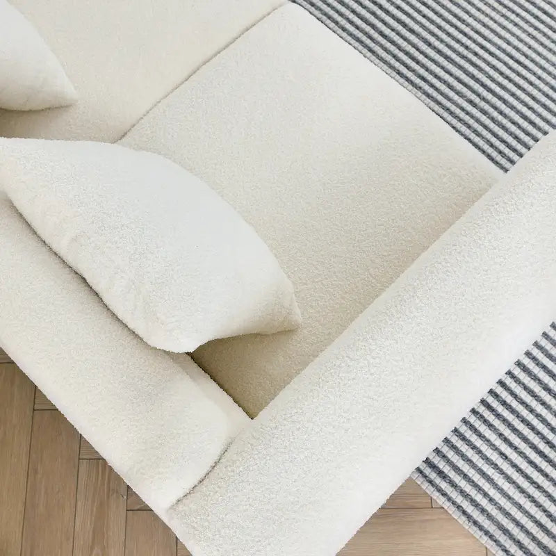 Canapé Art Déco 3 places en tissu Teddy, 3 coussins lombaires et pieds en métal doré — 205 cm